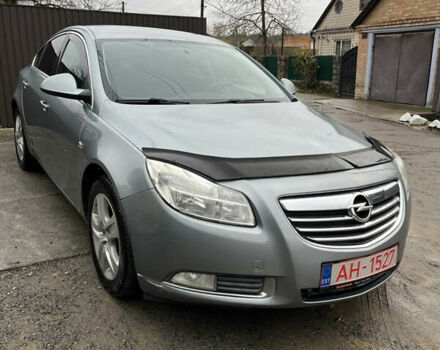 Серый Опель Инсигния, объемом двигателя 2 л и пробегом 260 тыс. км за 5500 $, фото 1 на Automoto.ua