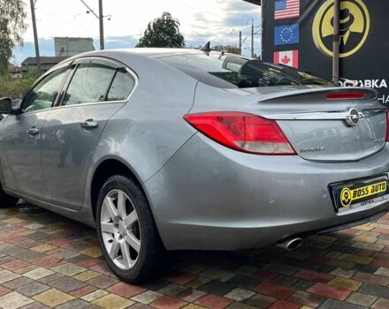 Серый Опель Инсигния, объемом двигателя 2 л и пробегом 217 тыс. км за 7900 $, фото 4 на Automoto.ua