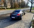 Серый Опель Инсигния, объемом двигателя 1.8 л и пробегом 213 тыс. км за 8900 $, фото 2 на Automoto.ua