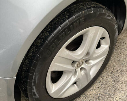 Серый Опель Инсигния, объемом двигателя 2 л и пробегом 260 тыс. км за 5500 $, фото 18 на Automoto.ua