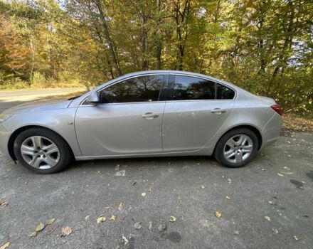 Серый Опель Инсигния, объемом двигателя 2 л и пробегом 280 тыс. км за 6500 $, фото 4 на Automoto.ua