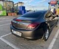 Серый Опель Инсигния, объемом двигателя 2 л и пробегом 230 тыс. км за 6900 $, фото 4 на Automoto.ua
