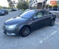 Серый Опель Инсигния, объемом двигателя 2 л и пробегом 276 тыс. км за 7700 $, фото 1 на Automoto.ua