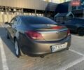 Серый Опель Инсигния, объемом двигателя 2 л и пробегом 230 тыс. км за 6900 $, фото 5 на Automoto.ua