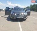 Серый Опель Инсигния, объемом двигателя 2 л и пробегом 150 тыс. км за 10300 $, фото 1 на Automoto.ua