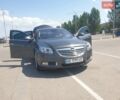 Серый Опель Инсигния, объемом двигателя 2 л и пробегом 150 тыс. км за 10300 $, фото 1 на Automoto.ua