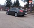 Серый Опель Инсигния, объемом двигателя 2 л и пробегом 285 тыс. км за 8350 $, фото 2 на Automoto.ua