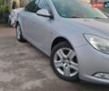 Серый Опель Инсигния, объемом двигателя 1.8 л и пробегом 152 тыс. км за 8700 $, фото 2 на Automoto.ua