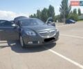 Серый Опель Инсигния, объемом двигателя 2 л и пробегом 150 тыс. км за 10300 $, фото 4 на Automoto.ua