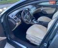 Серый Опель Инсигния, объемом двигателя 2 л и пробегом 276 тыс. км за 7700 $, фото 5 на Automoto.ua