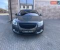 Серый Опель Инсигния, объемом двигателя 2 л и пробегом 90 тыс. км за 10300 $, фото 1 на Automoto.ua