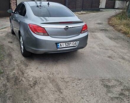 Серый Опель Инсигния, объемом двигателя 1.96 л и пробегом 300 тыс. км за 8000 $, фото 2 на Automoto.ua