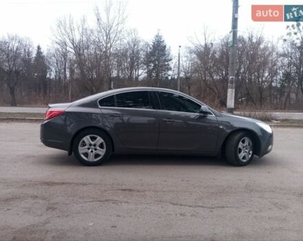 Серый Опель Инсигния, объемом двигателя 2 л и пробегом 285 тыс. км за 8350 $, фото 4 на Automoto.ua