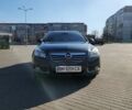 Серый Опель Инсигния, объемом двигателя 1.4 л и пробегом 210 тыс. км за 9000 $, фото 4 на Automoto.ua