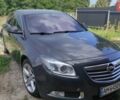 Серый Опель Инсигния, объемом двигателя 1.96 л и пробегом 335 тыс. км за 9500 $, фото 2 на Automoto.ua