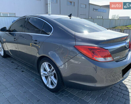 Серый Опель Инсигния, объемом двигателя 2 л и пробегом 318 тыс. км за 8200 $, фото 4 на Automoto.ua