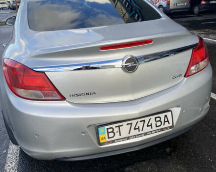 Сірий Опель Інсігнія, об'ємом двигуна 1.96 л та пробігом 205 тис. км за 11200 $, фото 3 на Automoto.ua