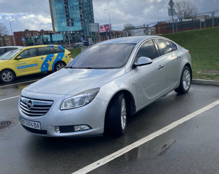 Сірий Опель Інсігнія, об'ємом двигуна 1.96 л та пробігом 205 тис. км за 11200 $, фото 1 на Automoto.ua