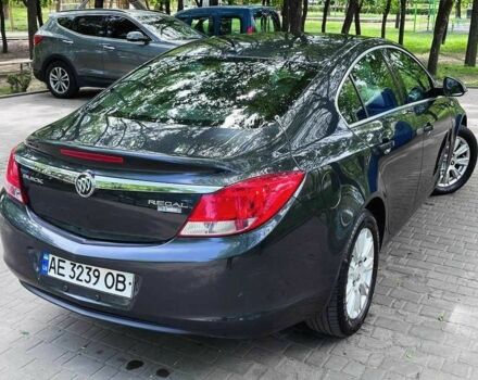 Серый Опель Инсигния, объемом двигателя 2.4 л и пробегом 165 тыс. км за 9500 $, фото 2 на Automoto.ua