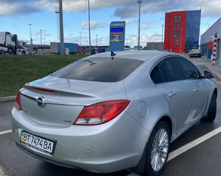 Сірий Опель Інсігнія, об'ємом двигуна 1.96 л та пробігом 205 тис. км за 11200 $, фото 2 на Automoto.ua