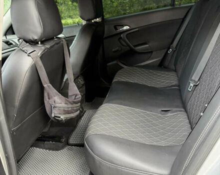 Серый Опель Инсигния, объемом двигателя 2 л и пробегом 241 тыс. км за 8300 $, фото 20 на Automoto.ua