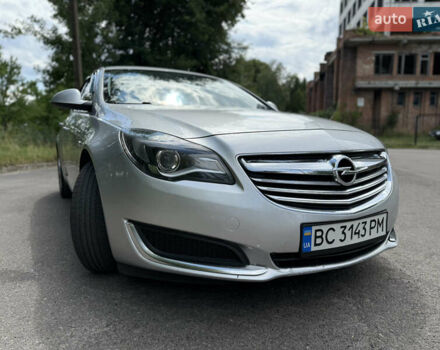Серый Опель Инсигния, объемом двигателя 2 л и пробегом 241 тыс. км за 8300 $, фото 4 на Automoto.ua