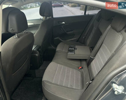 Серый Опель Инсигния, объемом двигателя 1.96 л и пробегом 211 тыс. км за 10200 $, фото 6 на Automoto.ua