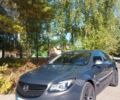 Серый Опель Инсигния, объемом двигателя 2 л и пробегом 169 тыс. км за 14500 $, фото 1 на Automoto.ua