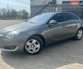 Серый Опель Инсигния, объемом двигателя 1.6 л и пробегом 235 тыс. км за 9350 $, фото 1 на Automoto.ua