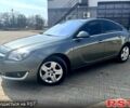 Серый Опель Инсигния, объемом двигателя 1.6 л и пробегом 227 тыс. км за 11750 $, фото 1 на Automoto.ua