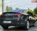Сірий Опель Інсігнія, об'ємом двигуна 1.6 л та пробігом 161 тис. км за 10999 $, фото 10 на Automoto.ua