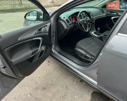 Серый Опель Инсигния, объемом двигателя 1.6 л и пробегом 155 тыс. км за 10100 $, фото 4 на Automoto.ua