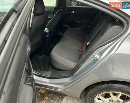 Серый Опель Инсигния, объемом двигателя 1.6 л и пробегом 155 тыс. км за 10100 $, фото 7 на Automoto.ua