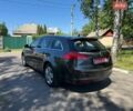Серый Опель Инсигния, объемом двигателя 1.8 л и пробегом 190 тыс. км за 7650 $, фото 4 на Automoto.ua