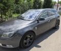 Сірий Опель Інсігнія, об'ємом двигуна 2 л та пробігом 455 тис. км за 7619 $, фото 1 на Automoto.ua