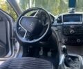 Сірий Опель Інсігнія, об'ємом двигуна 2 л та пробігом 247 тис. км за 7100 $, фото 2 на Automoto.ua