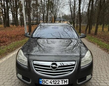 Серый Опель Инсигния, объемом двигателя 2 л и пробегом 210 тыс. км за 159 $, фото 1 на Automoto.ua