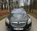 Серый Опель Инсигния, объемом двигателя 2 л и пробегом 210 тыс. км за 159 $, фото 1 на Automoto.ua