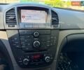Серый Опель Инсигния, объемом двигателя 1.8 л и пробегом 190 тыс. км за 7650 $, фото 30 на Automoto.ua