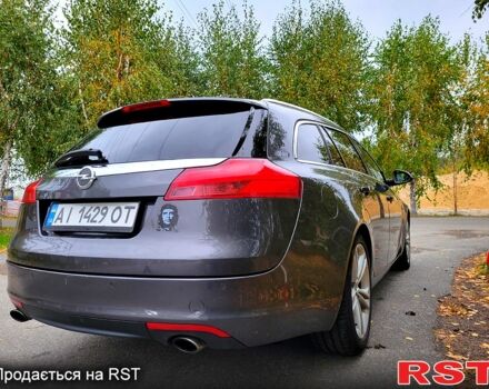 Серый Опель Инсигния, объемом двигателя 2 л и пробегом 175 тыс. км за 7500 $, фото 3 на Automoto.ua