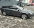 Серый Опель Инсигния, объемом двигателя 2 л и пробегом 303 тыс. км за 8500 $, фото 4 на Automoto.ua