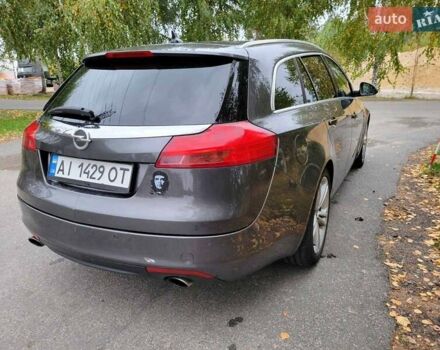Серый Опель Инсигния, объемом двигателя 2 л и пробегом 185 тыс. км за 7200 $, фото 4 на Automoto.ua