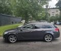 Серый Опель Инсигния, объемом двигателя 2 л и пробегом 330 тыс. км за 4000 $, фото 5 на Automoto.ua