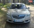 Серый Опель Инсигния, объемом двигателя 2 л и пробегом 302 тыс. км за 5500 $, фото 1 на Automoto.ua