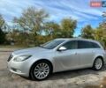 Сірий Опель Інсігнія, об'ємом двигуна 2 л та пробігом 290 тис. км за 6500 $, фото 12 на Automoto.ua