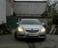 Серый Опель Инсигния, объемом двигателя 2 л и пробегом 330 тыс. км за 6479 $, фото 1 на Automoto.ua