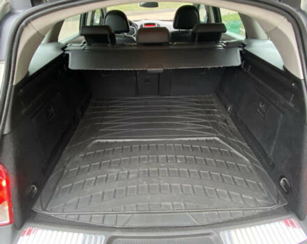 Серый Опель Инсигния, объемом двигателя 2 л и пробегом 299 тыс. км за 7500 $, фото 18 на Automoto.ua