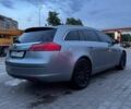 Сірий Опель Інсігнія, об'ємом двигуна 2 л та пробігом 230 тис. км за 7999 $, фото 3 на Automoto.ua