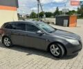 Серый Опель Инсигния, объемом двигателя 1.96 л и пробегом 300 тыс. км за 5900 $, фото 8 на Automoto.ua