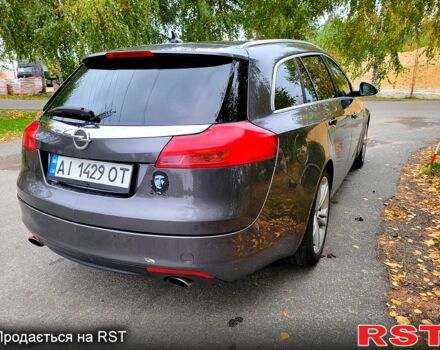 Серый Опель Инсигния, объемом двигателя 2 л и пробегом 175 тыс. км за 7500 $, фото 4 на Automoto.ua
